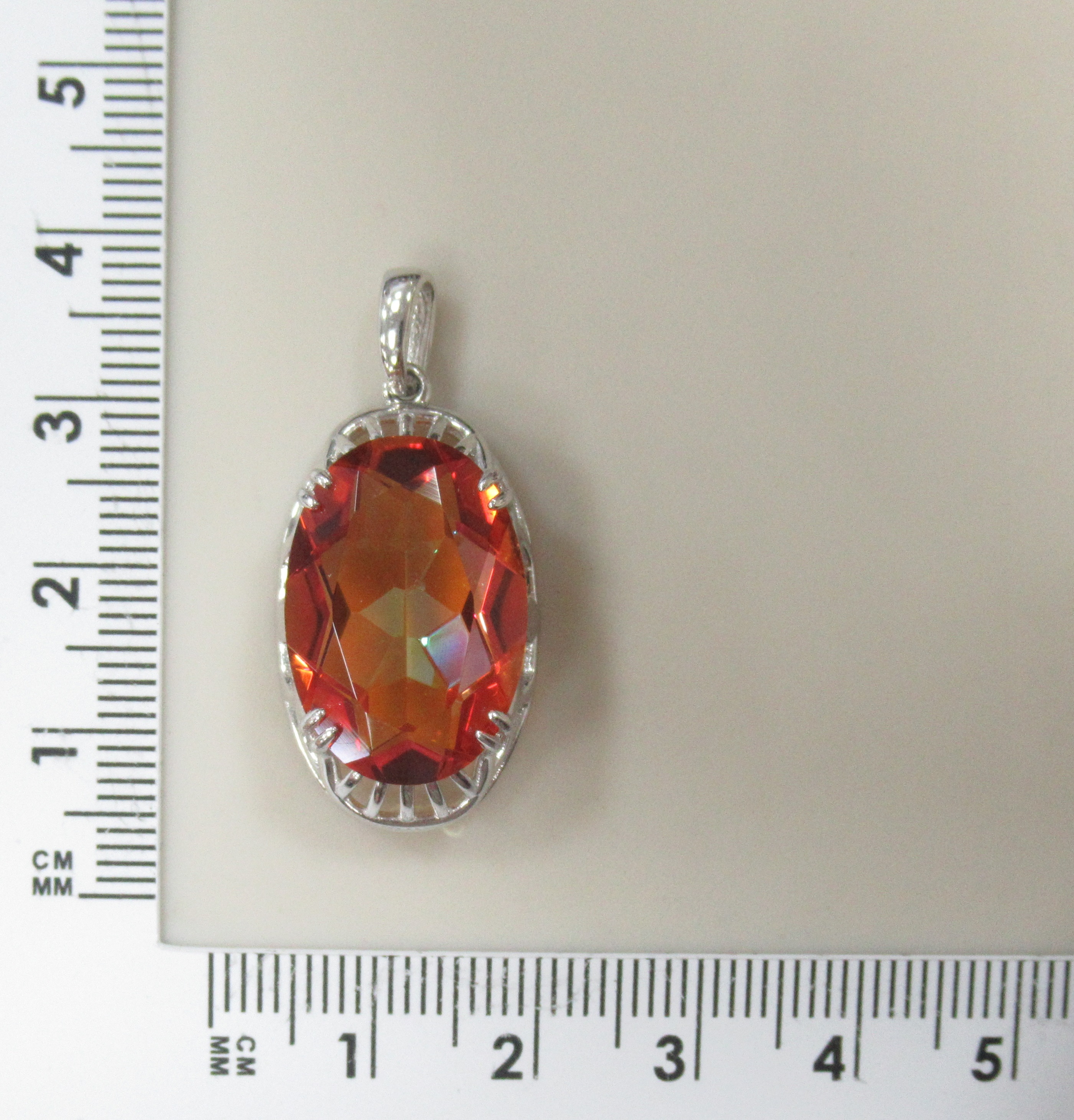 Серебряная подвеска с оранжевым горным хрусталем